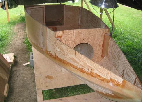 The boat right side up to tape inside bilges