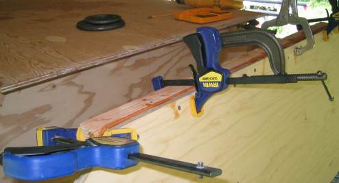 Gluing and clamping bottom transom frame member