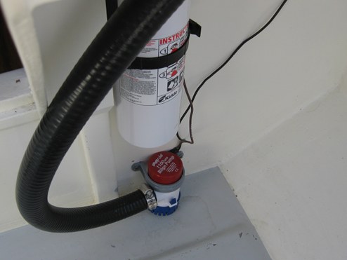 I mounted the pump up front under the steering consol with a plastic pipe bracket