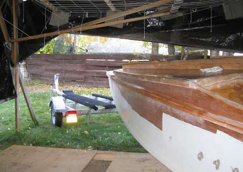 The trailer is aligned in position to receive the boat