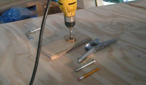A backing block is being added to the bow plate for the 8-inch galvanized anchoring cleat