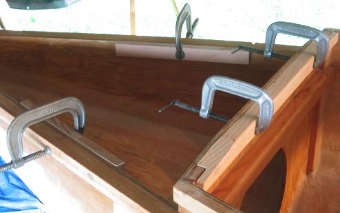 Adding two pieces of wood inside the hull sides for mounting