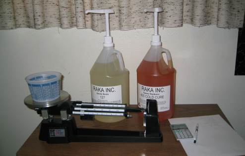 Measuring epoxy by mass with a balance beam scale