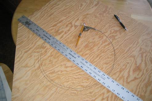 Drawing access hole with compass