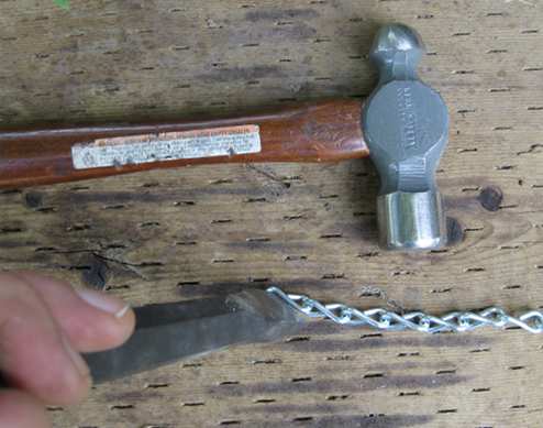 Opening up a link on a lightweight chain