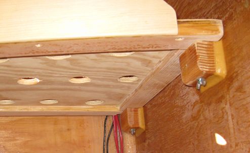 Detail of how the shelf is fastened to the sides of the cabin