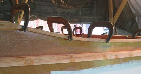 Any excess epoxy squeezed out from the clamping was scraped off with a nylon putty knife