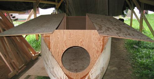 The cabin top panels are positioned over the cabin