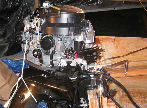 The engine cowling has to come off as well as the plastic shielding from the right lower half of the engine