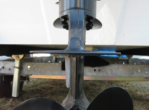 The outboard's cavitation plate is sitting at one-inch below the bottom of the transom, as 
referenced to the keel
