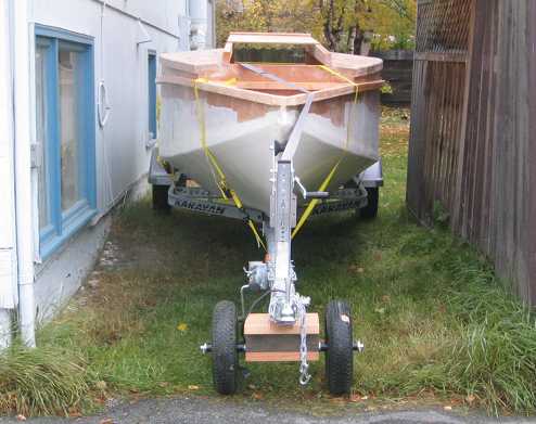 Pushing Intrepid out of the backyard between the buildings