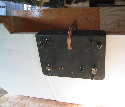 The Suzuki dealership let me borrow a metal template that you can clamp to your transom that shows where the holes 
need to be drilled to mount the motor