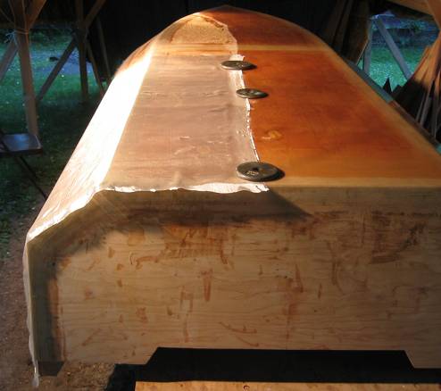 The fiberglass cloth was applied to the right side; it was time to start on the left side