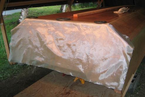 6-ounce fiberglass cloth is draped across the transom, and held up with a few weights