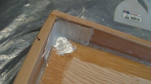 The hatch is being assembled and reinforced with fiberglass