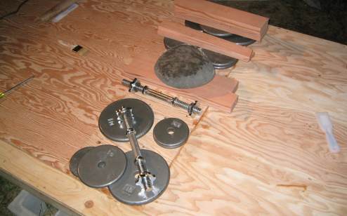 Added weight to  plywood butt to keep it clamped in place