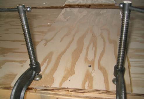 Screw holds ply butt from moving around in epoxy