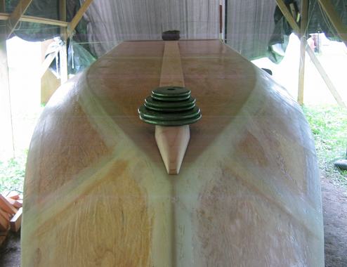 The keel is positioned and weighted down to drill some pilot holes from the bottom up into 
the keel