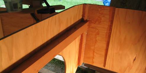 Fiberglass applied between Bulkhead 4 and the sides