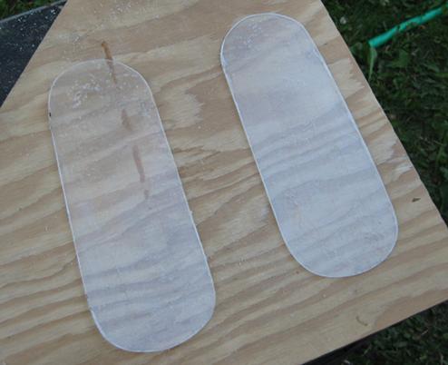 The cut-out Plexiglas pieces