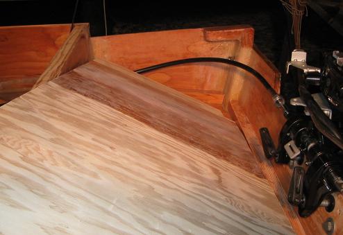The deck plate is temporarily screwed down and sealed with a flexible caulking adhesive
