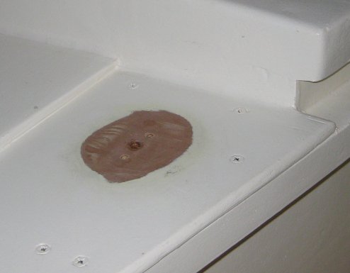 The bow plate was cleared of paint at the mounting location