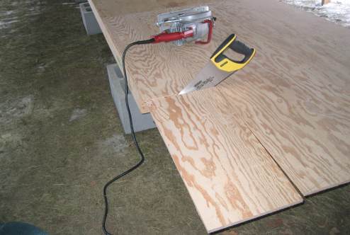 Notch being cut out with hand saw