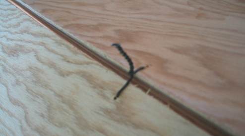Excess wire is snipped off