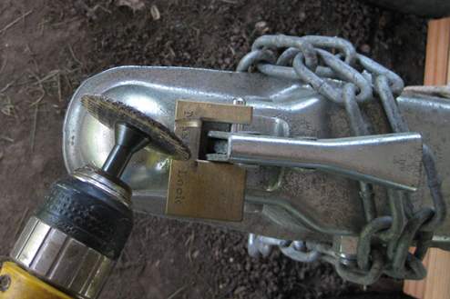 Using grinding wheel to cut off coupler lock due to a lost key