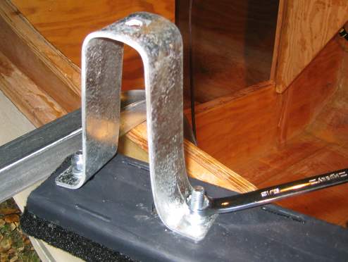 Attach the extender brackets to the bunks