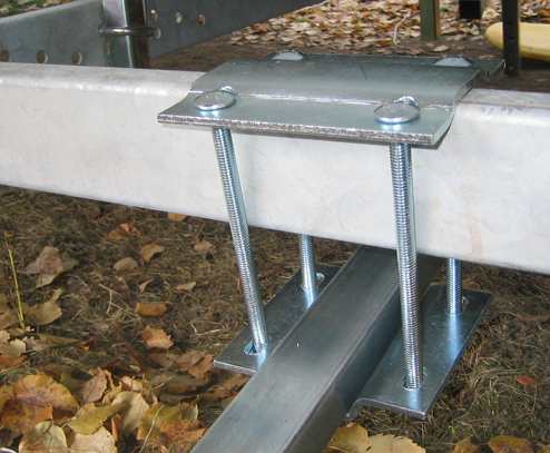 Mounting support arm clamps to trailer's frame