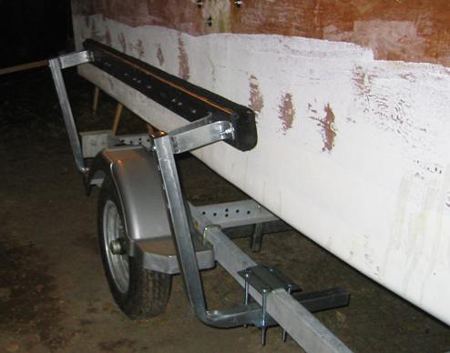 Attach trailer bunks to support arms