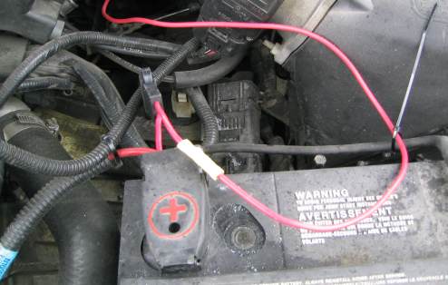 Connecting the pig tail and the power wire to the battery