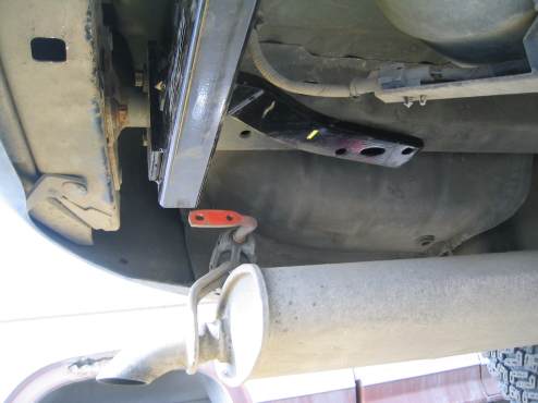 Detaching muffler hangers to make room