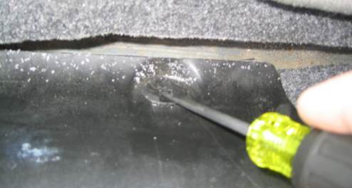 Taking off the trim to expose the tail light wires