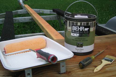Getting ready to attach a4 by 4 to the trailer once it is prepared