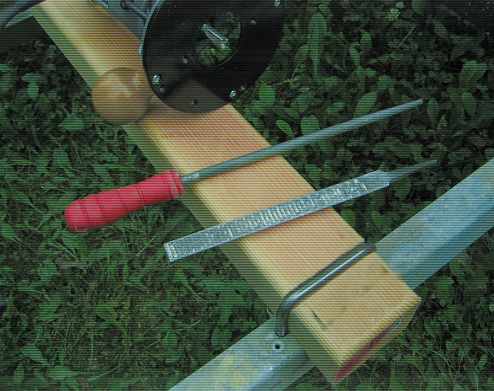 I made a notches on the wood to recess the u-bolts using a router