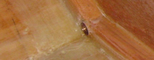 Transom drain pipe sealed with wood flour mixture in cockpit