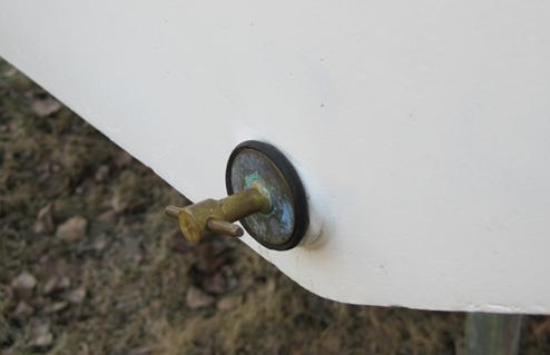 Drain plug in place in the transom drain pipe
