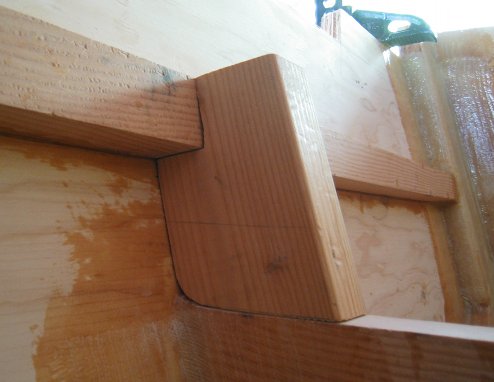 A wedge of sorts was placed between the transom knee and the deck frame
